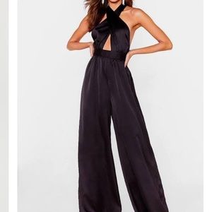 PrettyLittleThing | Black satin halter tie wide leg backless jumpsuit •